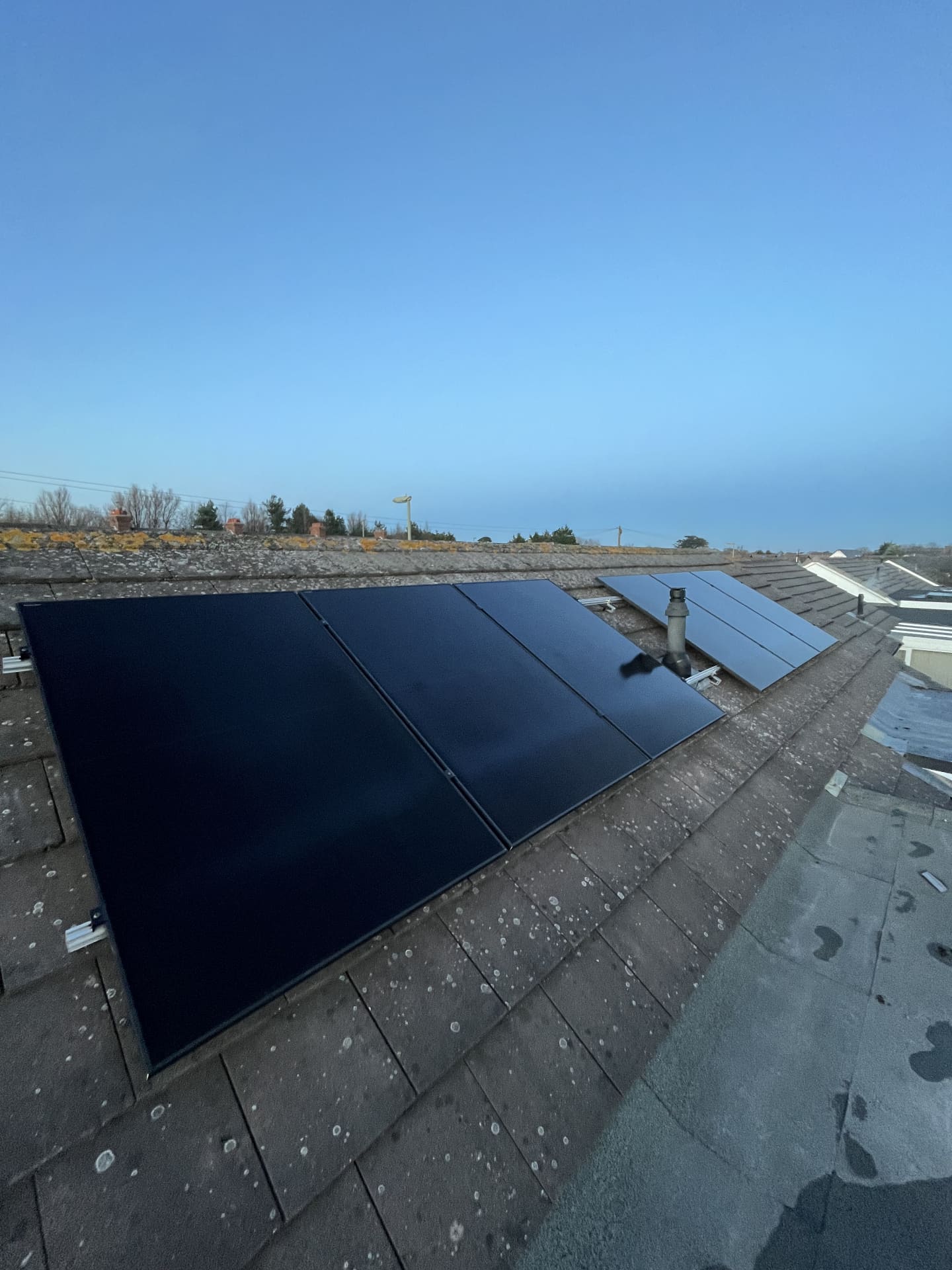 Close-up of black rooftop solar panels